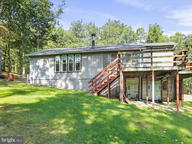 front view of a house with a big yard