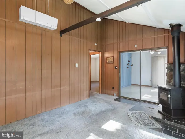 a view of a hallway with a chandelier
