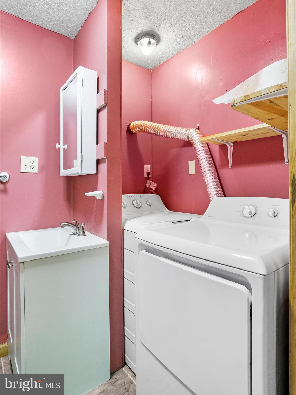 867 Mason Road Hedgesville, WV 25427 - Photo 20 of 39 a utility room with dryer and washer
