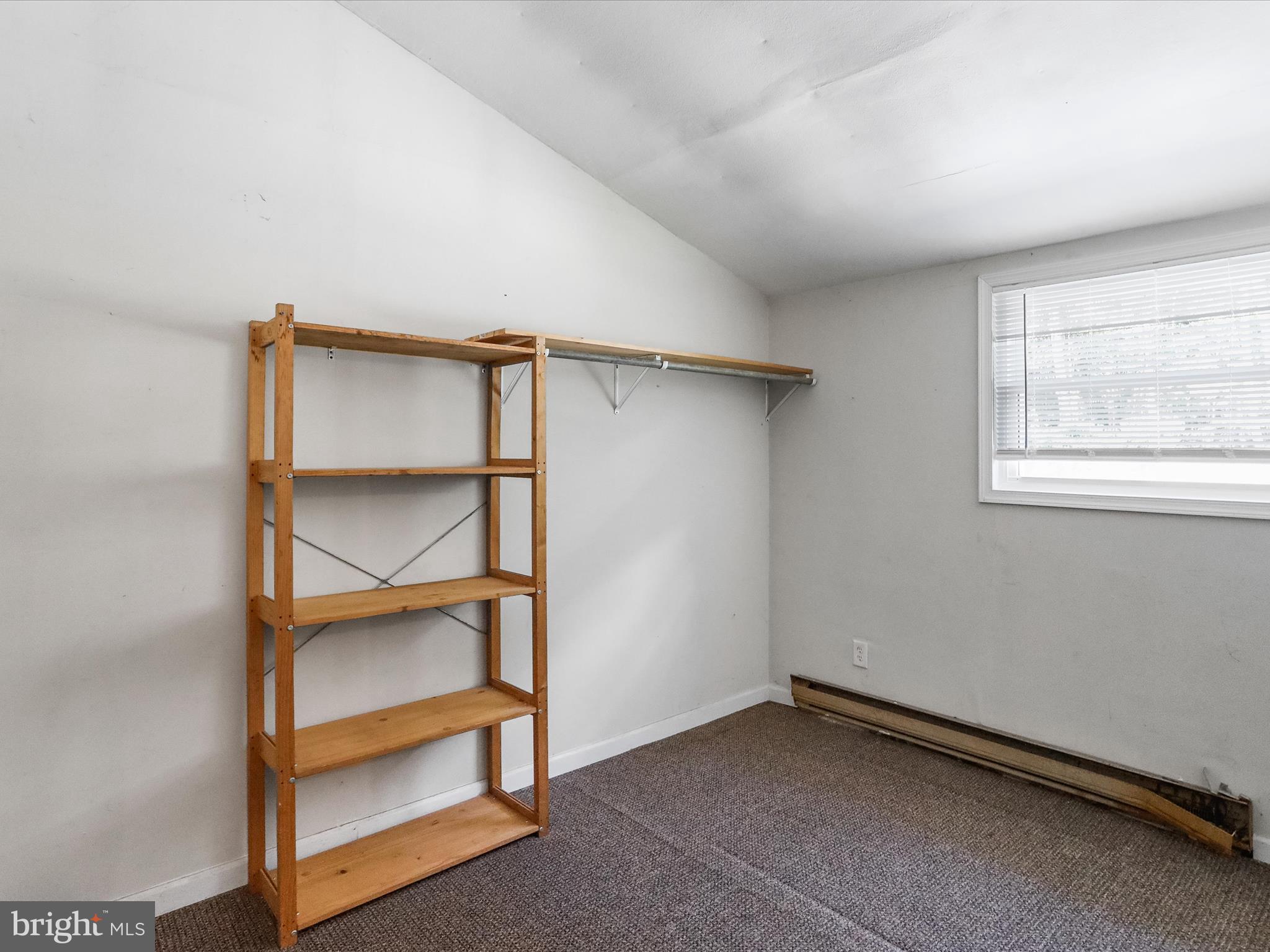 867 Mason Road Hedgesville, WV 25427 - Photo 23 of 39 a view of room with window and shelf