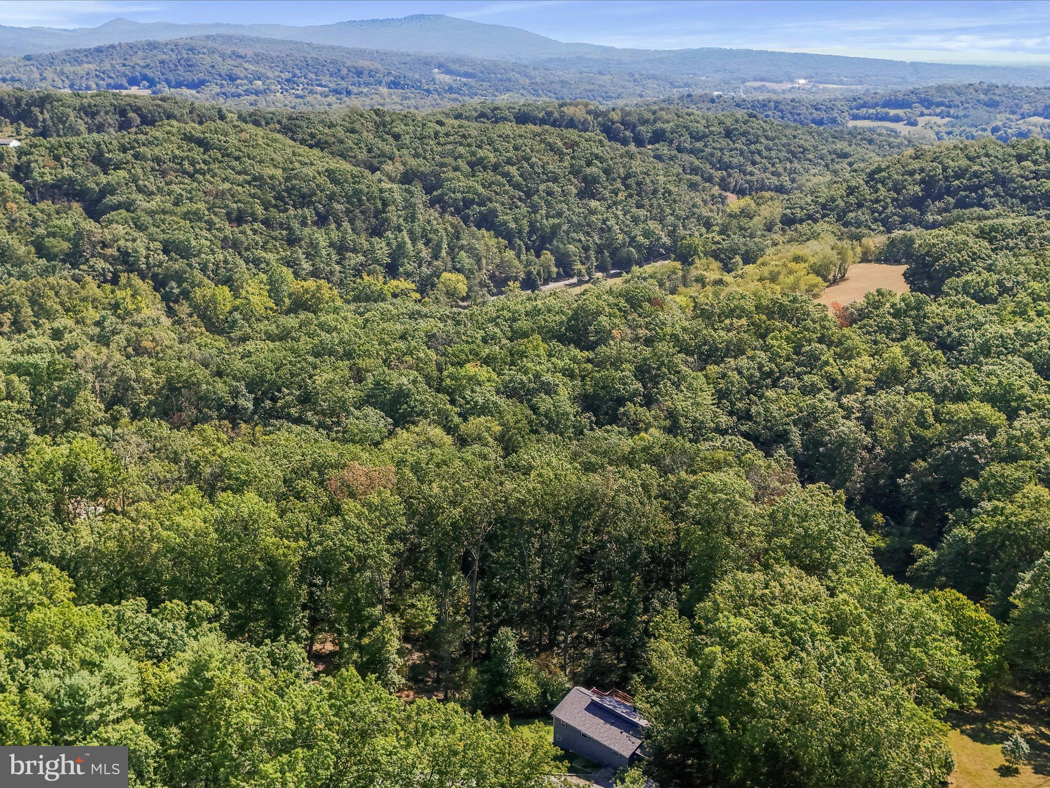 867 Mason Road Hedgesville, WV 25427 - Photo 33 of 39 an aerial view of a house with a yard