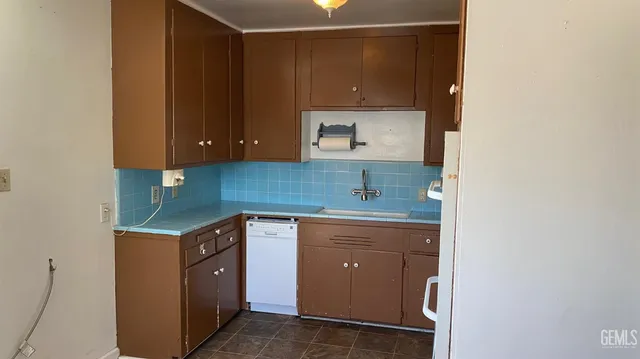 a room with a sink and a cabinets