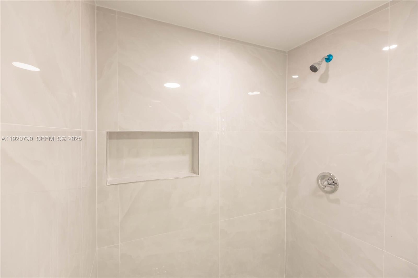 3180 Northwest 2nd Street Miami, FL 33125 - Photo 21 of 29 a bathroom with a shower