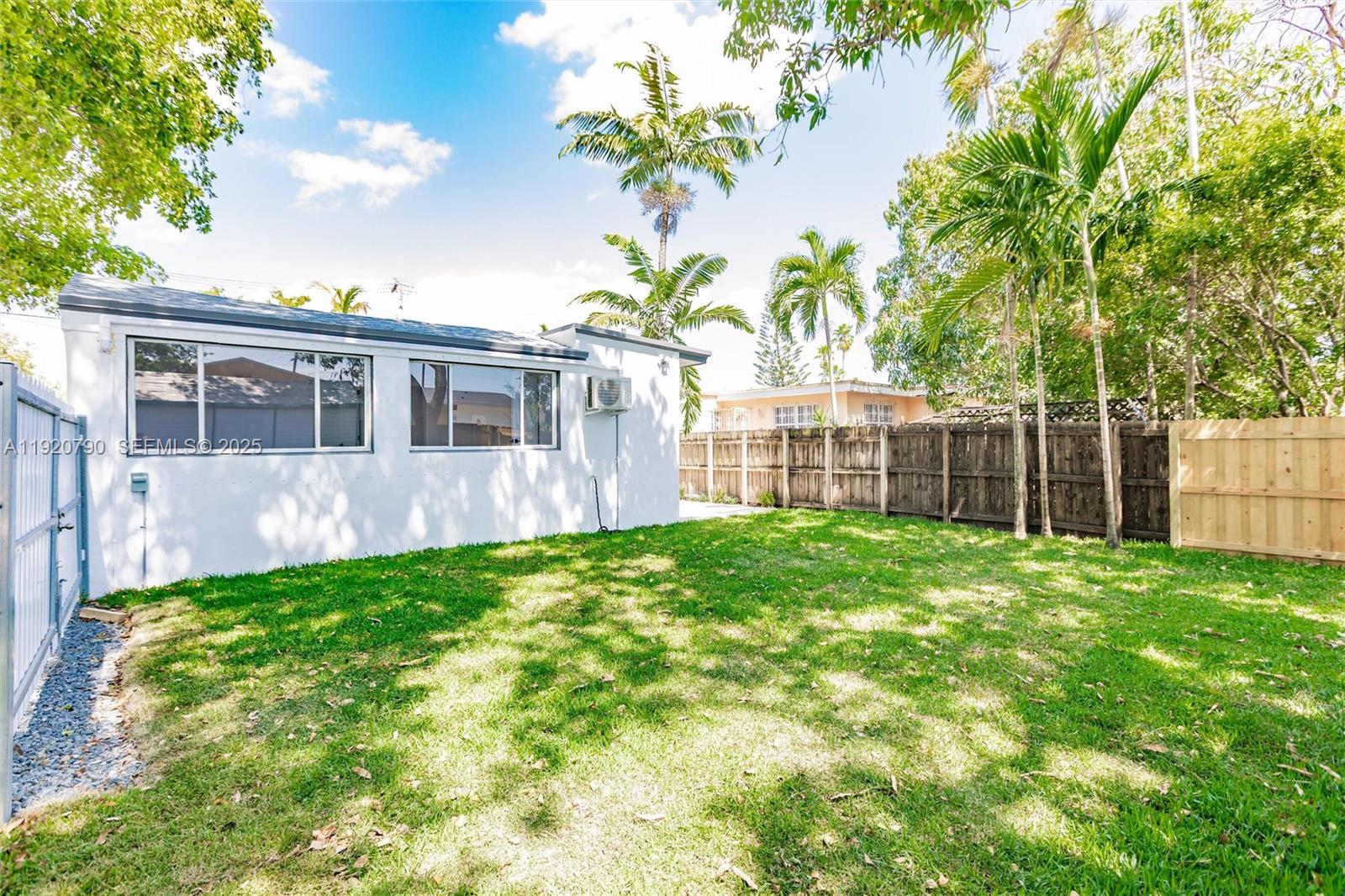 3180 Northwest 2nd Street Miami, FL 33125 - Photo 24 of 29 a view of a house with backyard and garden