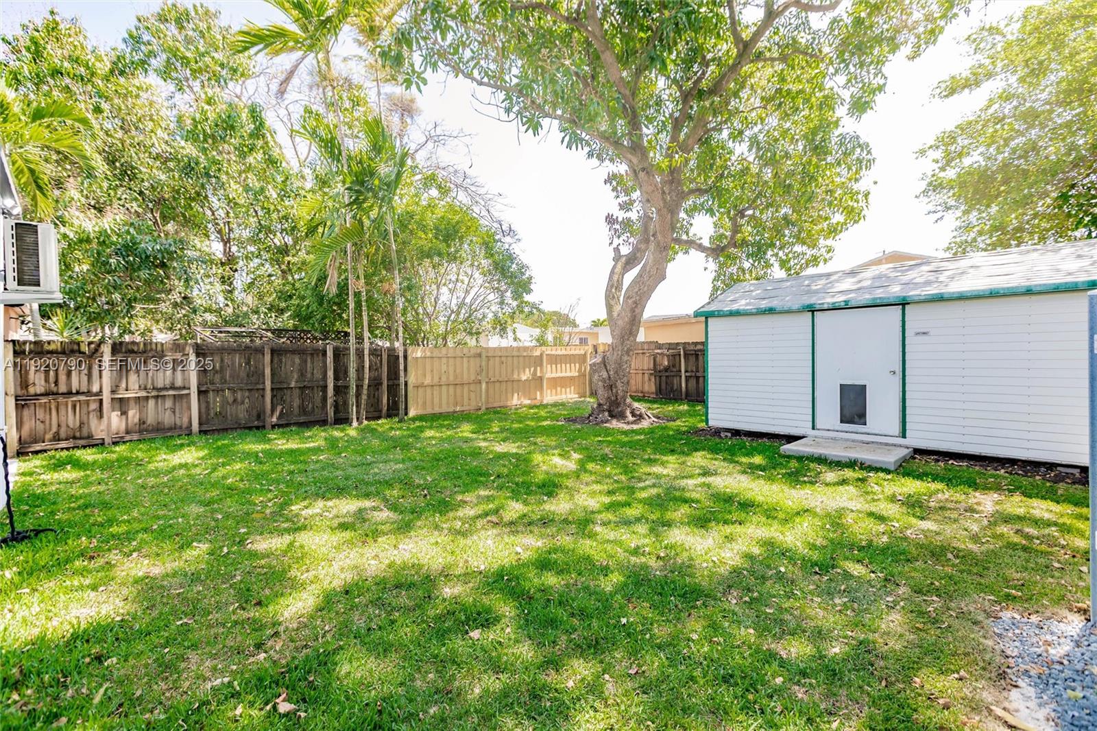 3180 Northwest 2nd Street Miami, FL 33125 - Photo 27 of 29 a view of a backyard with a garden