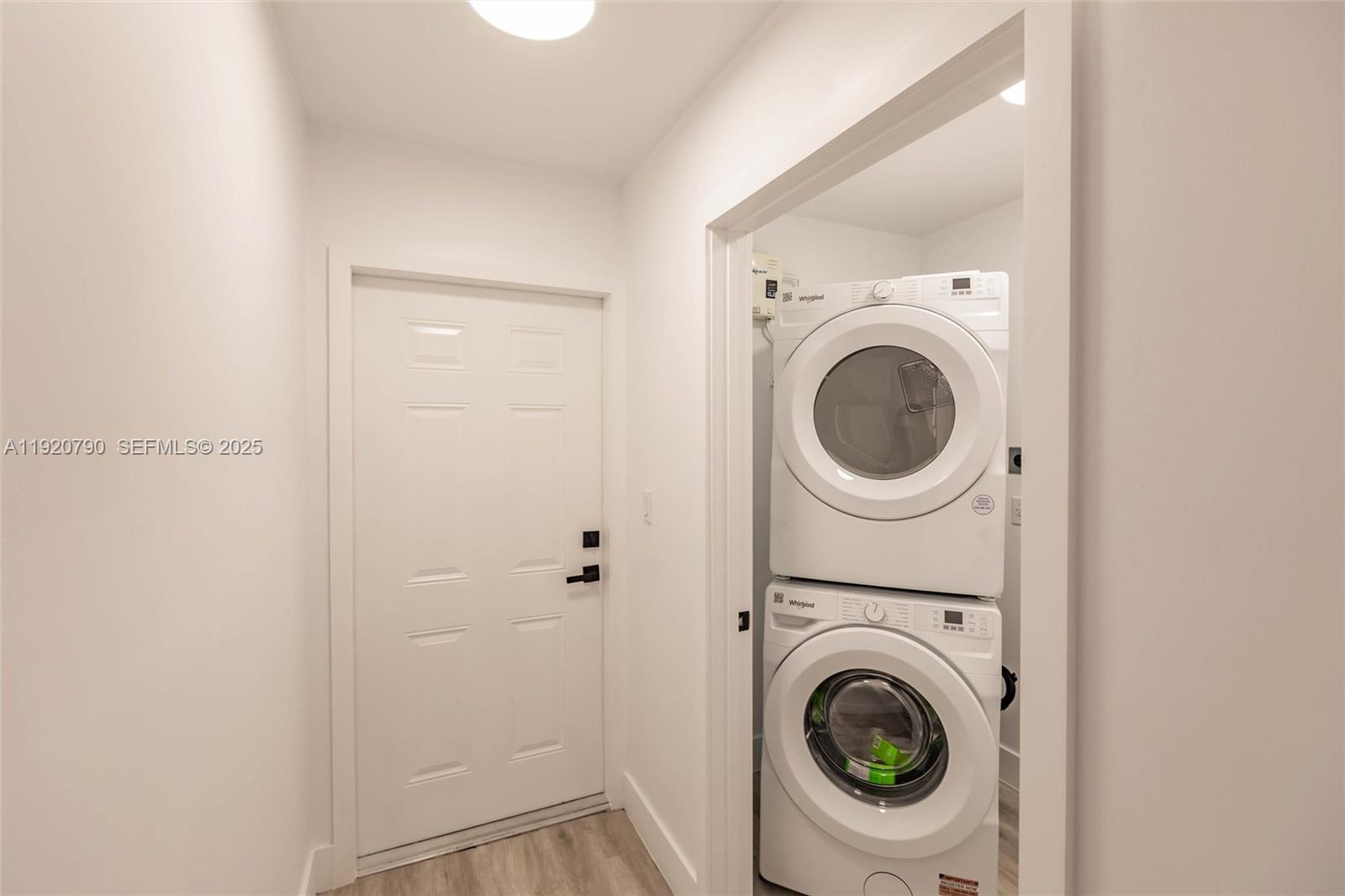 3180 Northwest 2nd Street Miami, FL 33125 - Photo 10 of 29 a utility room with dryer and washer