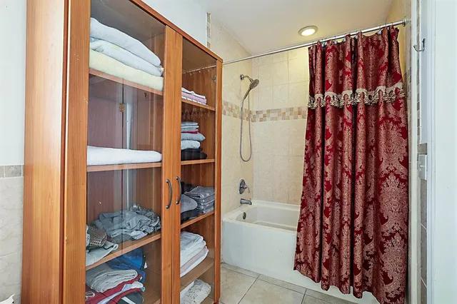 a view of backyard with a garden and stairs