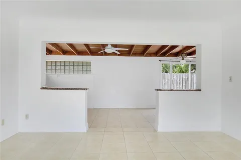 an empty room with shelves