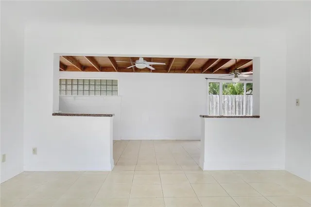 an empty room with shelves