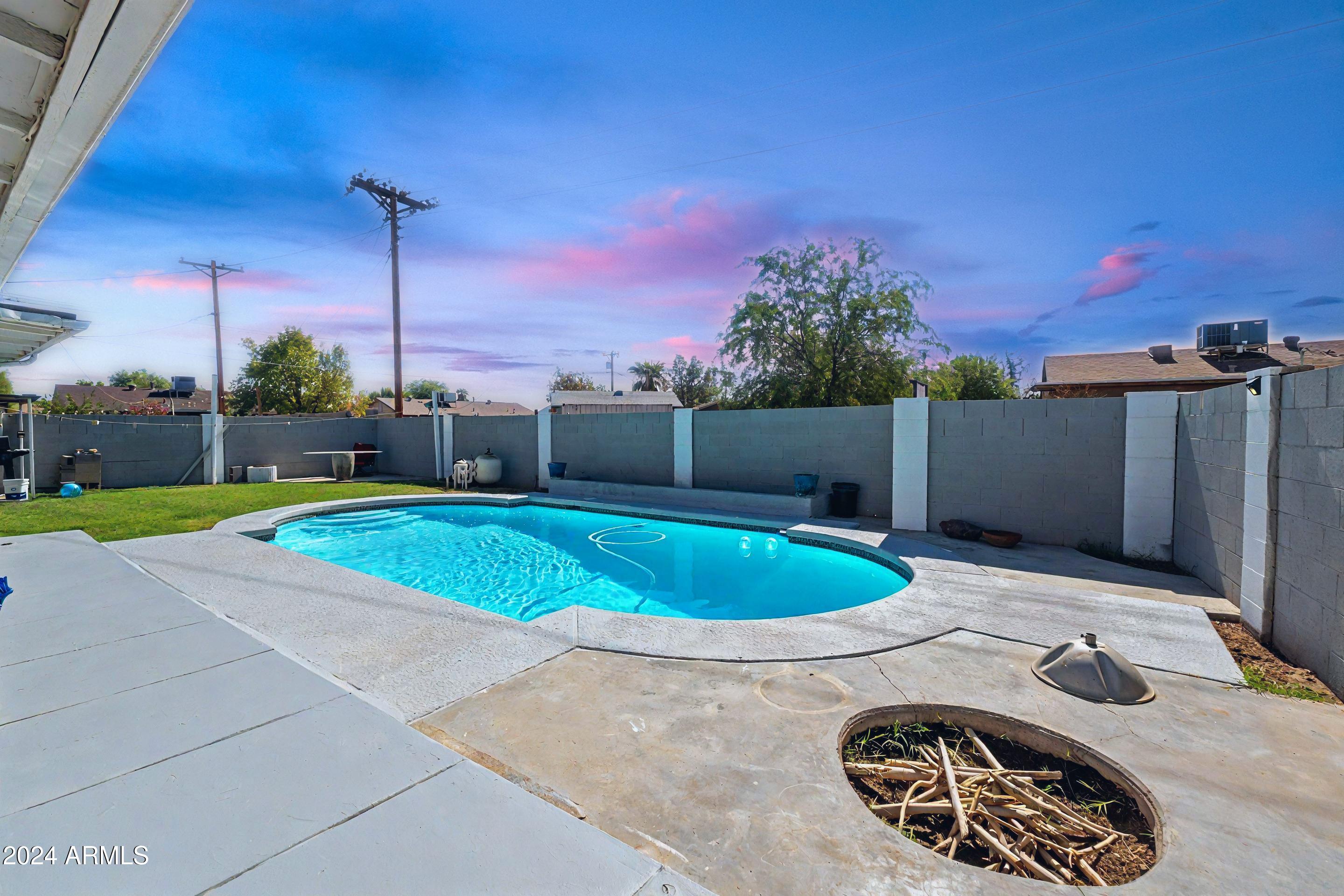 6515 West Cheery Lynn Road Phoenix, AZ 85033 - Photo 8 of 12 Backyard Pool Sunset