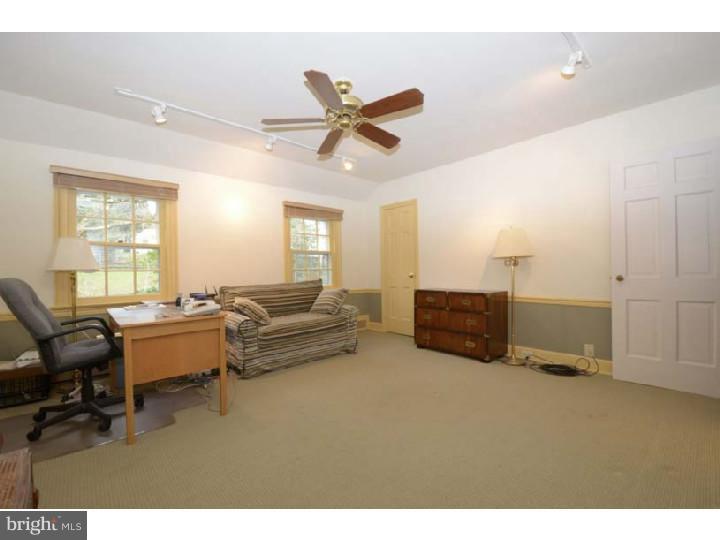 245 Mcclenaghan Mill Road Wynnewood, PA 19096 - Photo 15 of 22 a living room with furniture and a ceiling fan