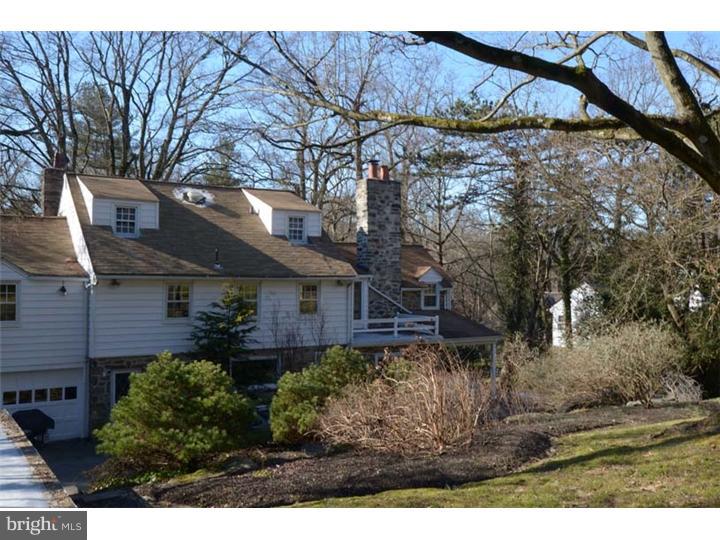 245 Mcclenaghan Mill Road Wynnewood, PA 19096 - Photo 20 of 22 a view of a house with a yard