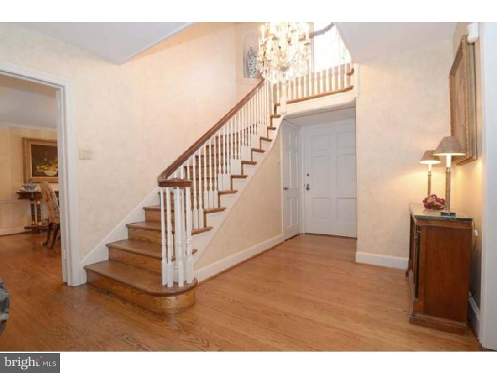 245 Mcclenaghan Mill Road Wynnewood, PA 19096 - Photo 3 of 22 a view of an entryway with wooden floor