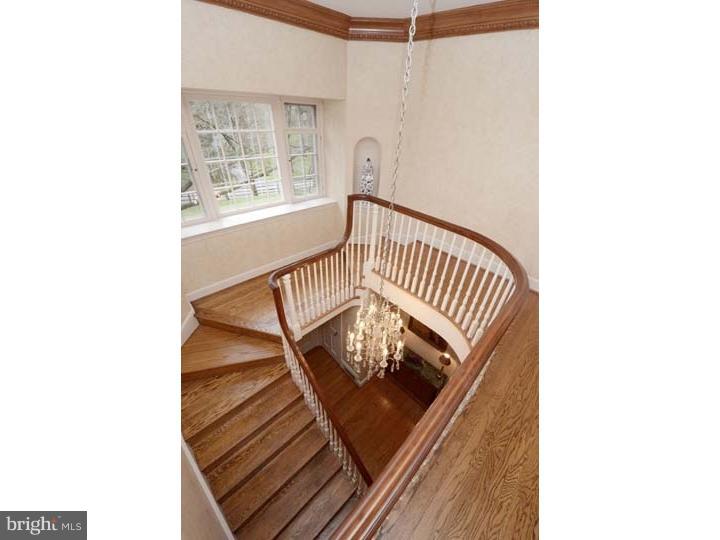 245 Mcclenaghan Mill Road Wynnewood, PA 19096 - Photo 10 of 22 a view of a balcony with furniture and stairs