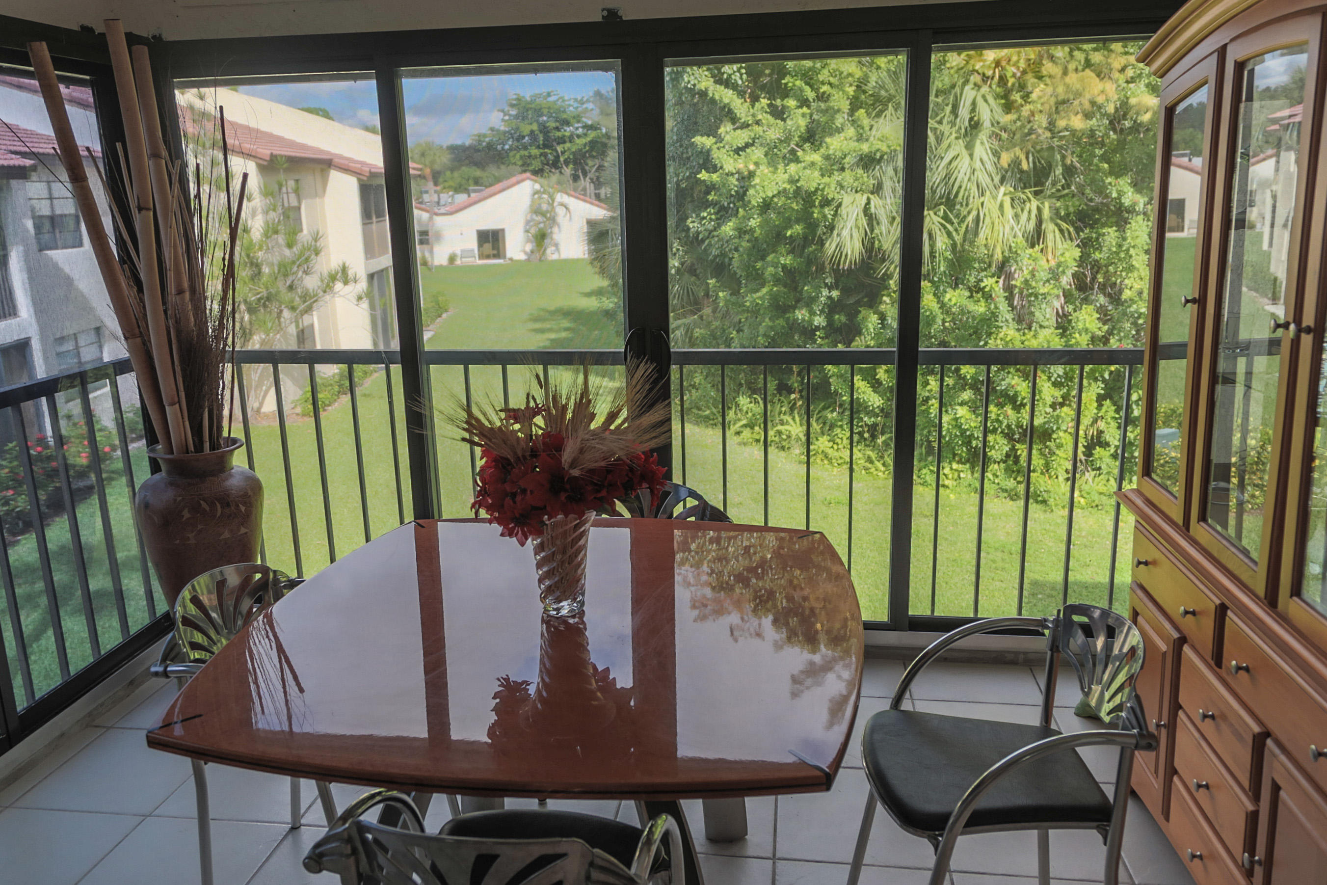 21726 Arriba Real, Unit 35B Boca Raton, FL 33433 - Photo 10 of 11 Screened Balcony