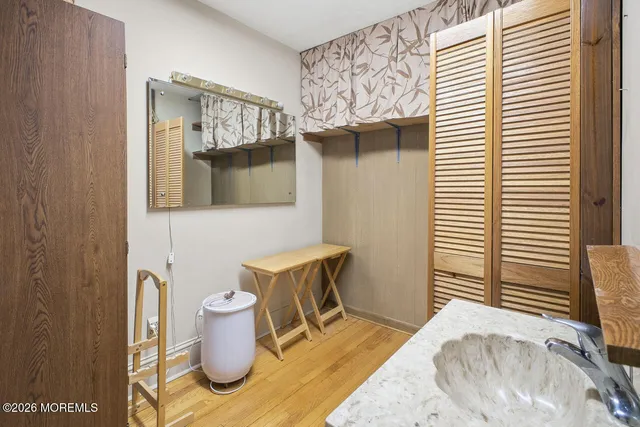 a bathroom with a toilet and a sink