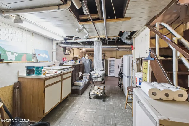 a kitchen with stainless steel appliances kitchen island granite countertop lots of counter top space