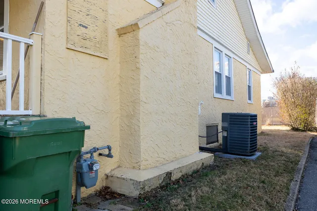 a view of a house with a door and wooden floor