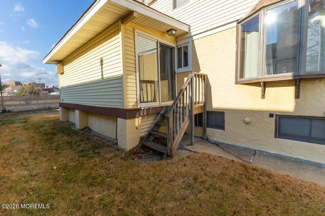 a house view with a backyard space