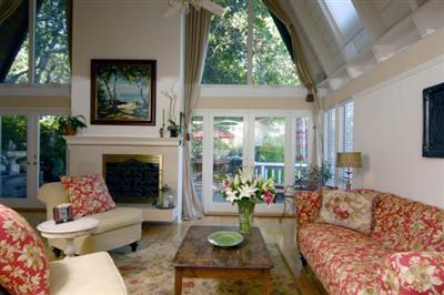 80 Manderly Road San Rafael, CA 94901 - Photo 1 of 9 a living room with furniture fireplace and a large window