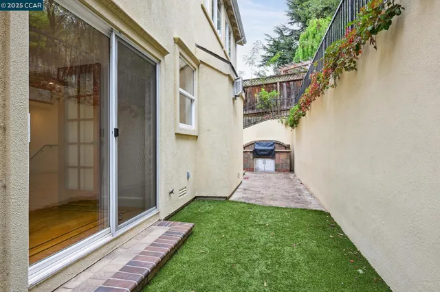 a view of a back yard of the house