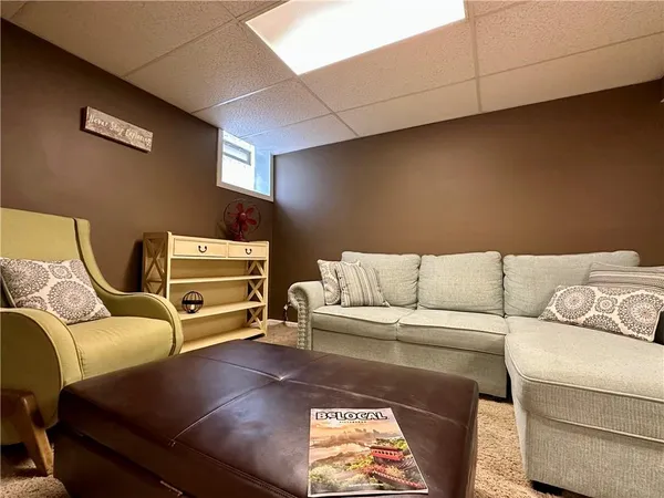 a living room with furniture and a couch