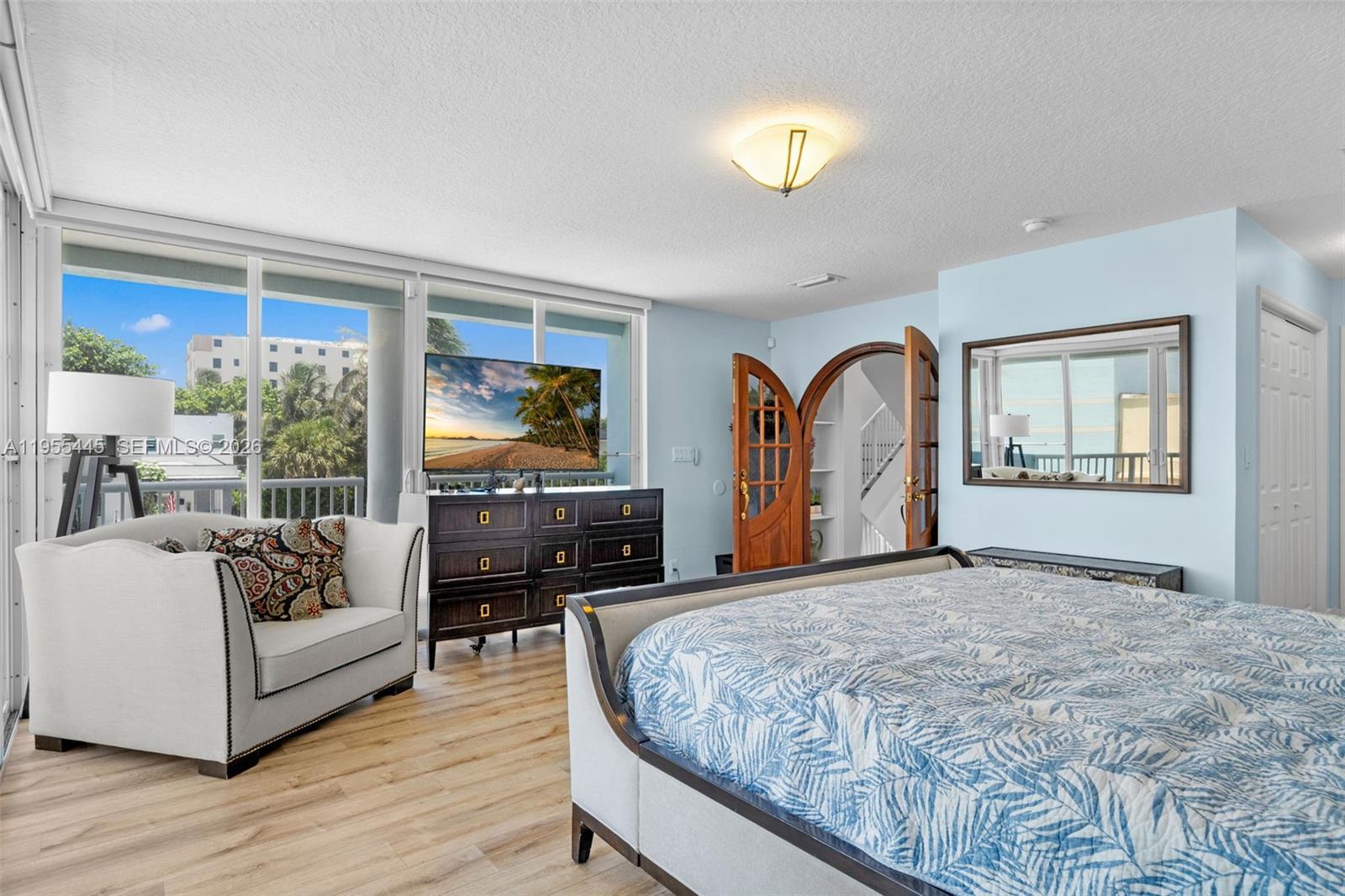 311 North Surf Road Hollywood, FL 33019 - Photo 19 of 61 a living room with furniture and a large window