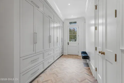 a view of a hallway with closet area