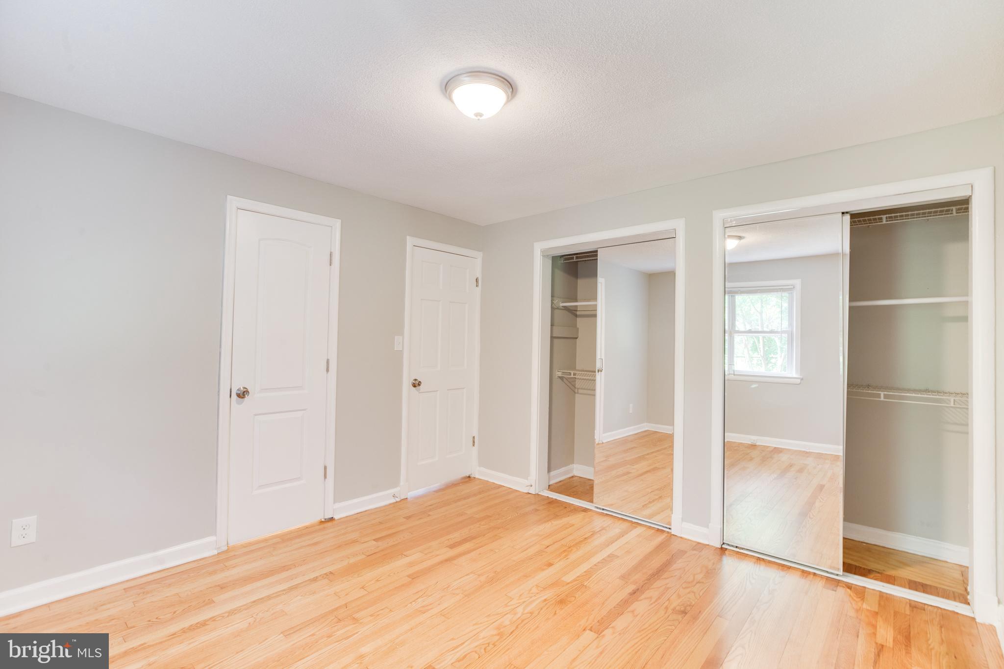5202 Cedar Road Alexandria, VA 22309 - Photo 27 of 65 Hardwood Flooring with double closet in Master Bed