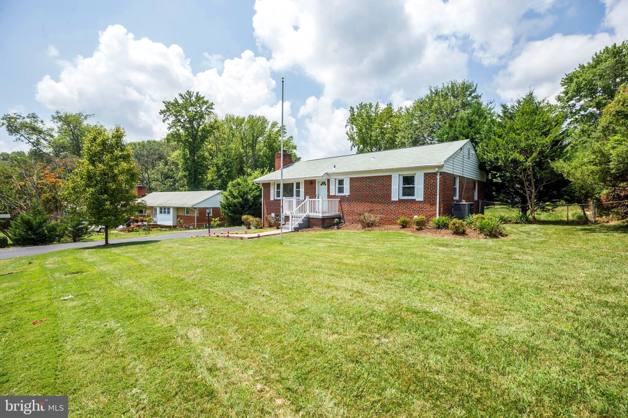 Expansive Front Yard with Beautiful House