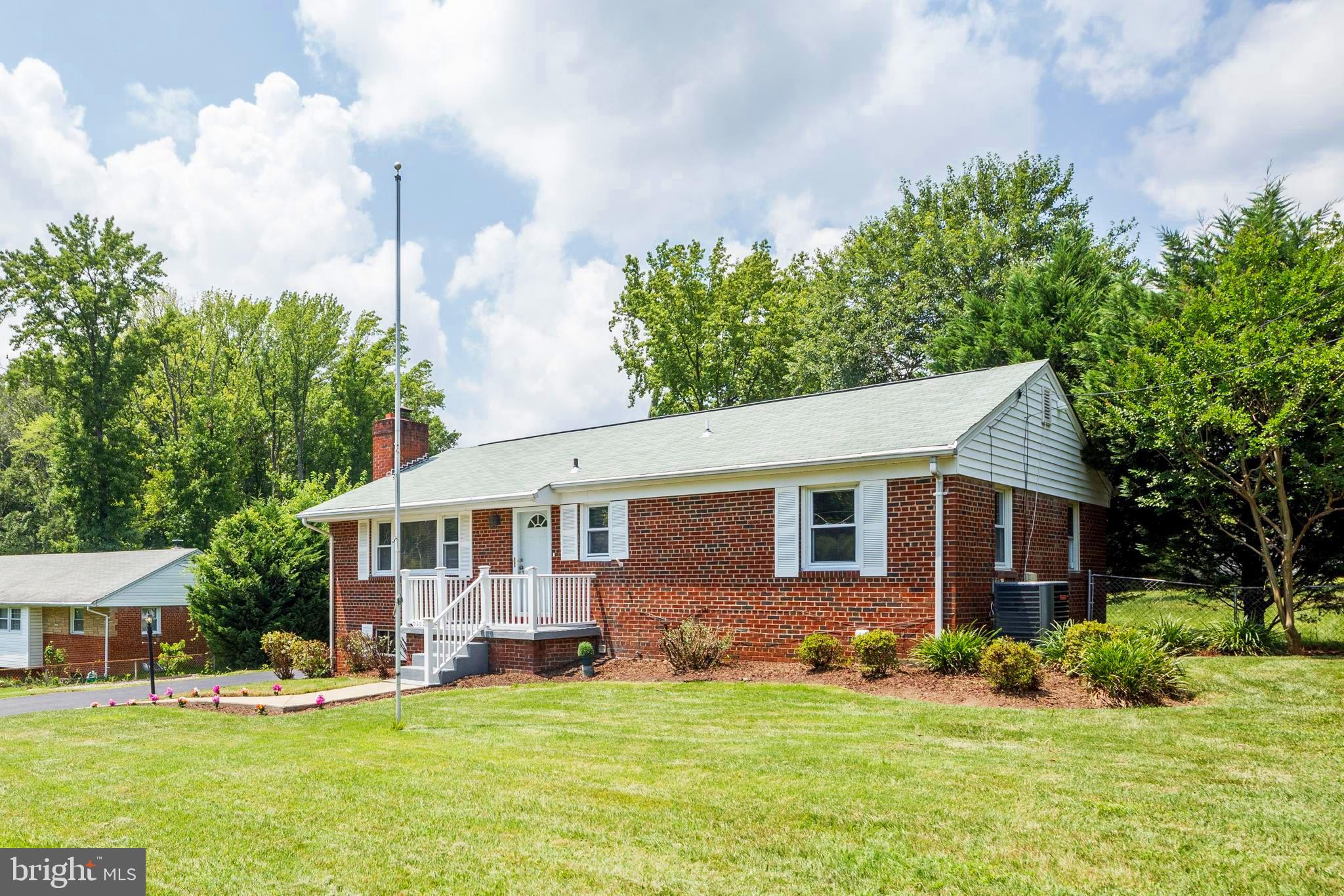 Appealing Front with Tree Line in the back