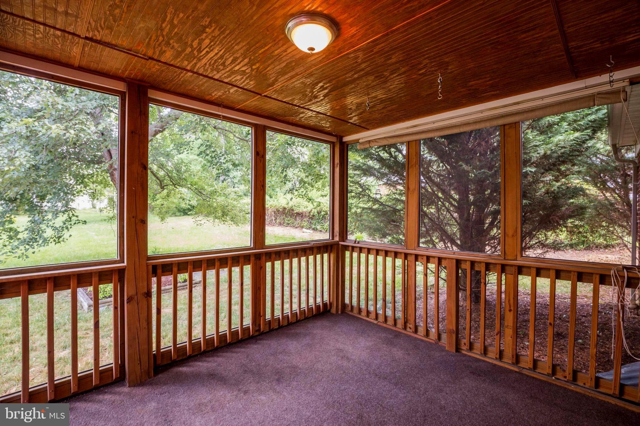 5202 Cedar Road Alexandria, VA 22309 - Photo 41 of 65 Screened Porch overlooking expansive backyard
