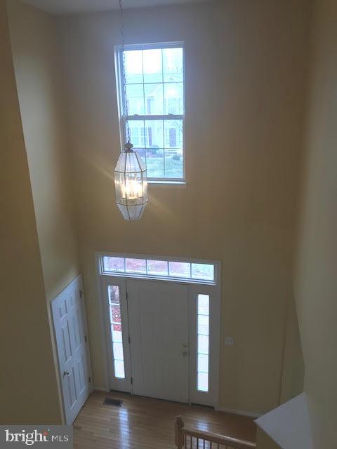 2025 Germander Way Woodbridge, VA 22192 - Photo 3 of 39 a room with wooden floor and windows