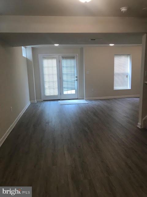 2025 Germander Way Woodbridge, VA 22192 - Photo 32 of 39 an empty room with wooden floor and windows