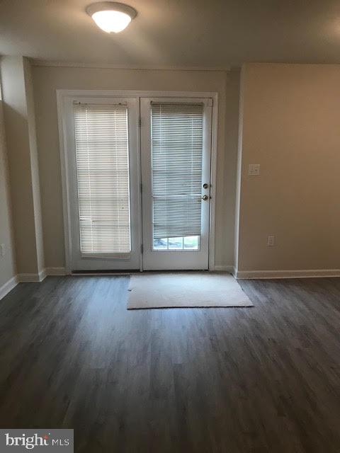 2025 Germander Way Woodbridge, VA 22192 - Photo 36 of 39 an empty room with wooden floor and windows