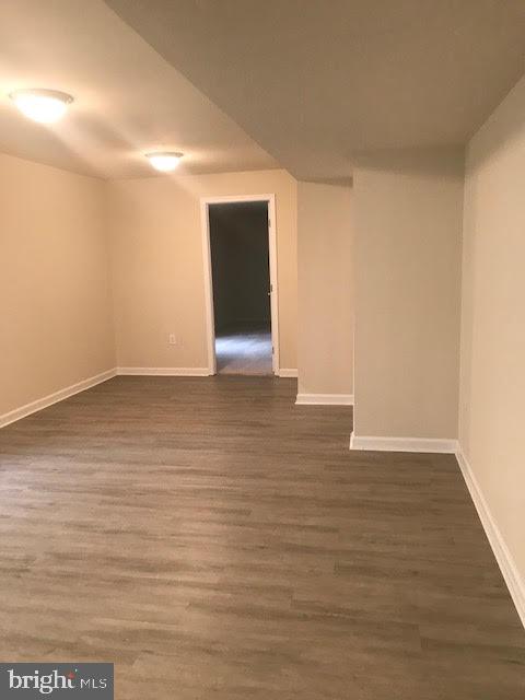 2025 Germander Way Woodbridge, VA 22192 - Photo 38 of 39 a view of an empty room with wooden floor