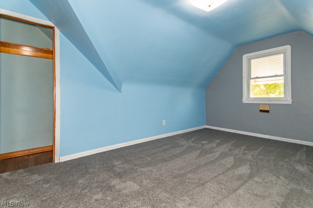 4210 Redfern Road Parma, OH 44134 - Photo 33 of 46 Additional living space featuring carpet flooring and vaulted ceiling
