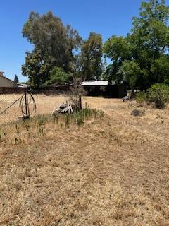 2060 Gettysburg Avenue Clovis, CA 93611 - Photo 28 of 40 a view of a lake with a yard