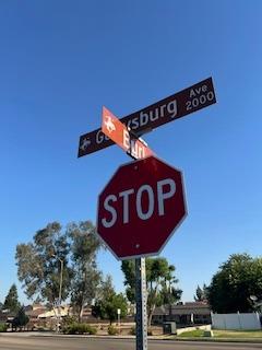 2060 Gettysburg Avenue Clovis, CA 93611 - Photo 34 of 40 a sign broad on a pole