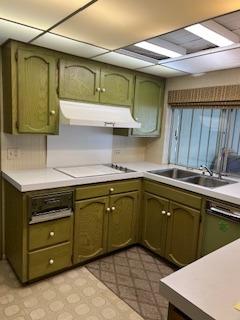 2060 Gettysburg Avenue Clovis, CA 93611 - Photo 5 of 40 a kitchen with a sink and cabinets