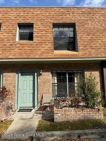 a view of house with outdoor space