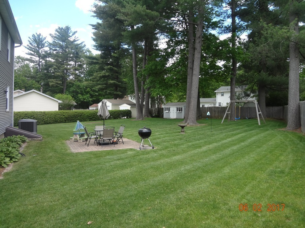 81 Calley Street Springfield, MA 01129 - Photo 21 of 26 a view of backyard with sitting area
