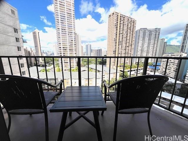 1850 Ala Moana Boulevard, Unit 915 Honolulu, HI 96815 - Photo 13 of 24 a view of a balcony with chairs