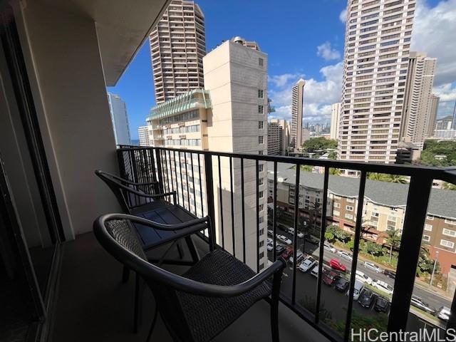 1850 Ala Moana Boulevard, Unit 915 Honolulu, HI 96815 - Photo 14 of 24 a view of a balcony with chairs