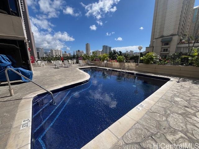 1850 Ala Moana Boulevard, Unit 915 Honolulu, HI 96815 - Photo 17 of 24 a view of a patio with swimming pool