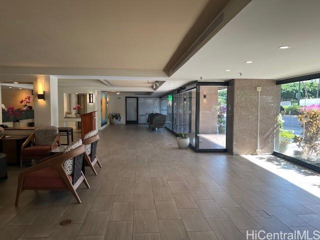 1850 Ala Moana Boulevard, Unit 915 Honolulu, HI 96815 - Photo 20 of 24 a view of a livingroom with furniture and a gym