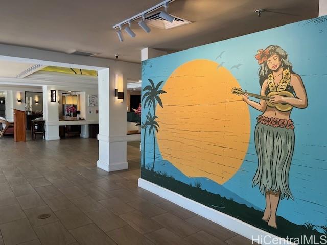 1850 Ala Moana Boulevard, Unit 915 Honolulu, HI 96815 - Photo 21 of 24 a view of a hallway with painted walls