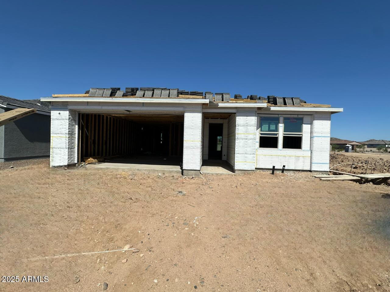 7586 West Av. Del Rey Peoria, AZ 85383 - Photo 2 of 18 a front view of a house