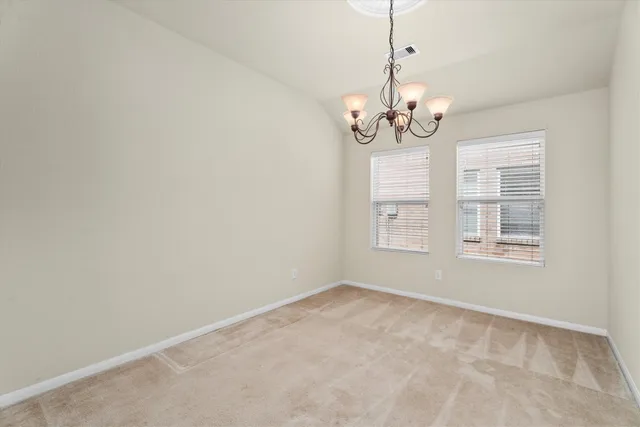 a view of a chandelier in a room