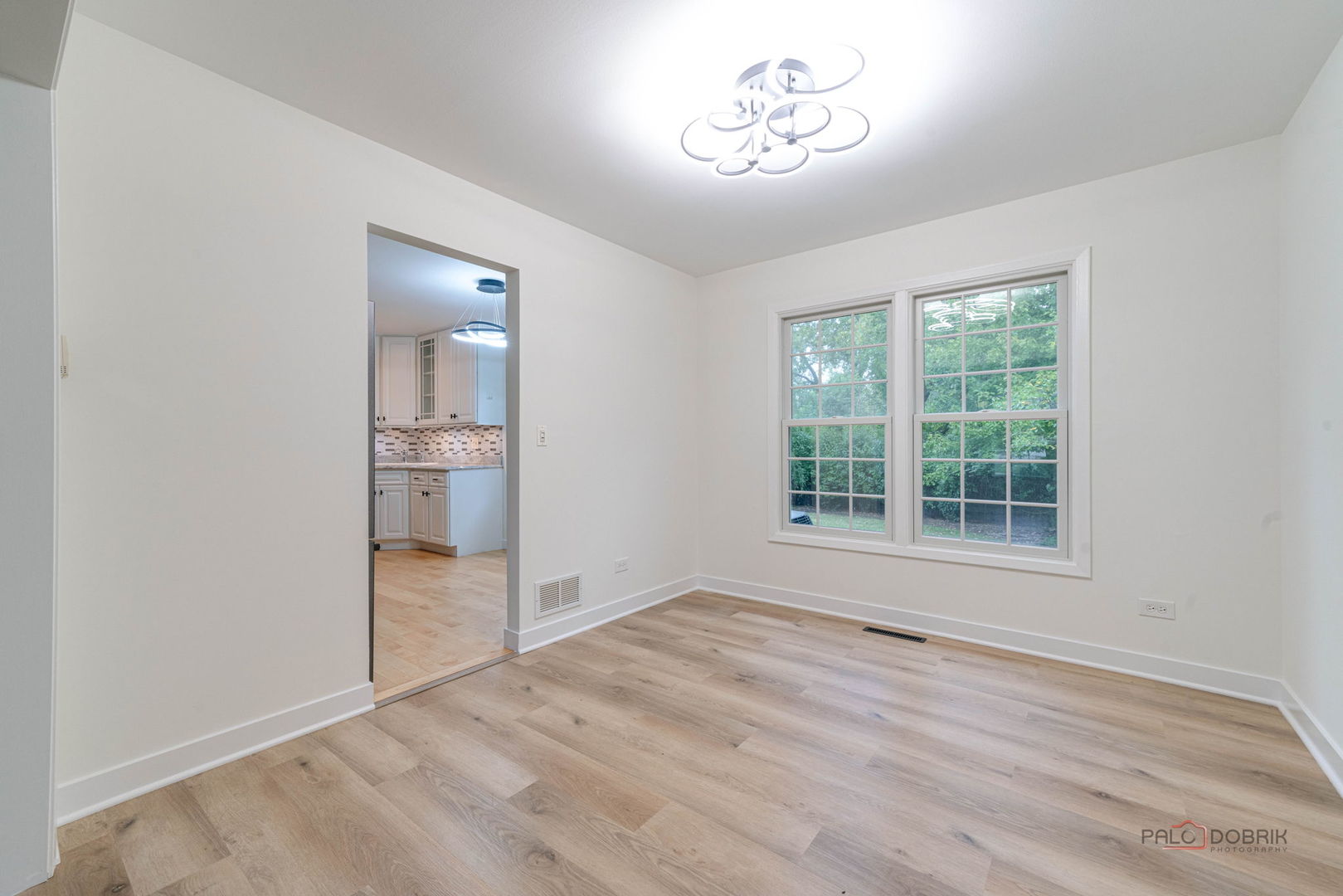 1338 Trinity Place Libertyville, IL 60048 - Photo 10 of 24 a view of an empty room with a window